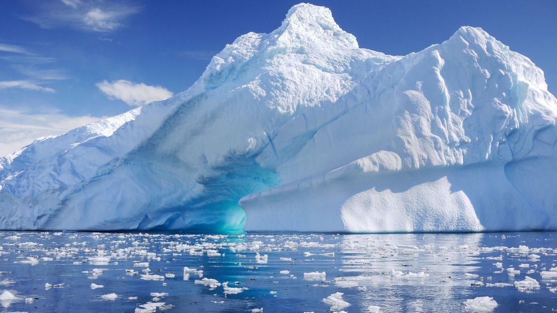 Towering blue iceberg in Antarctica